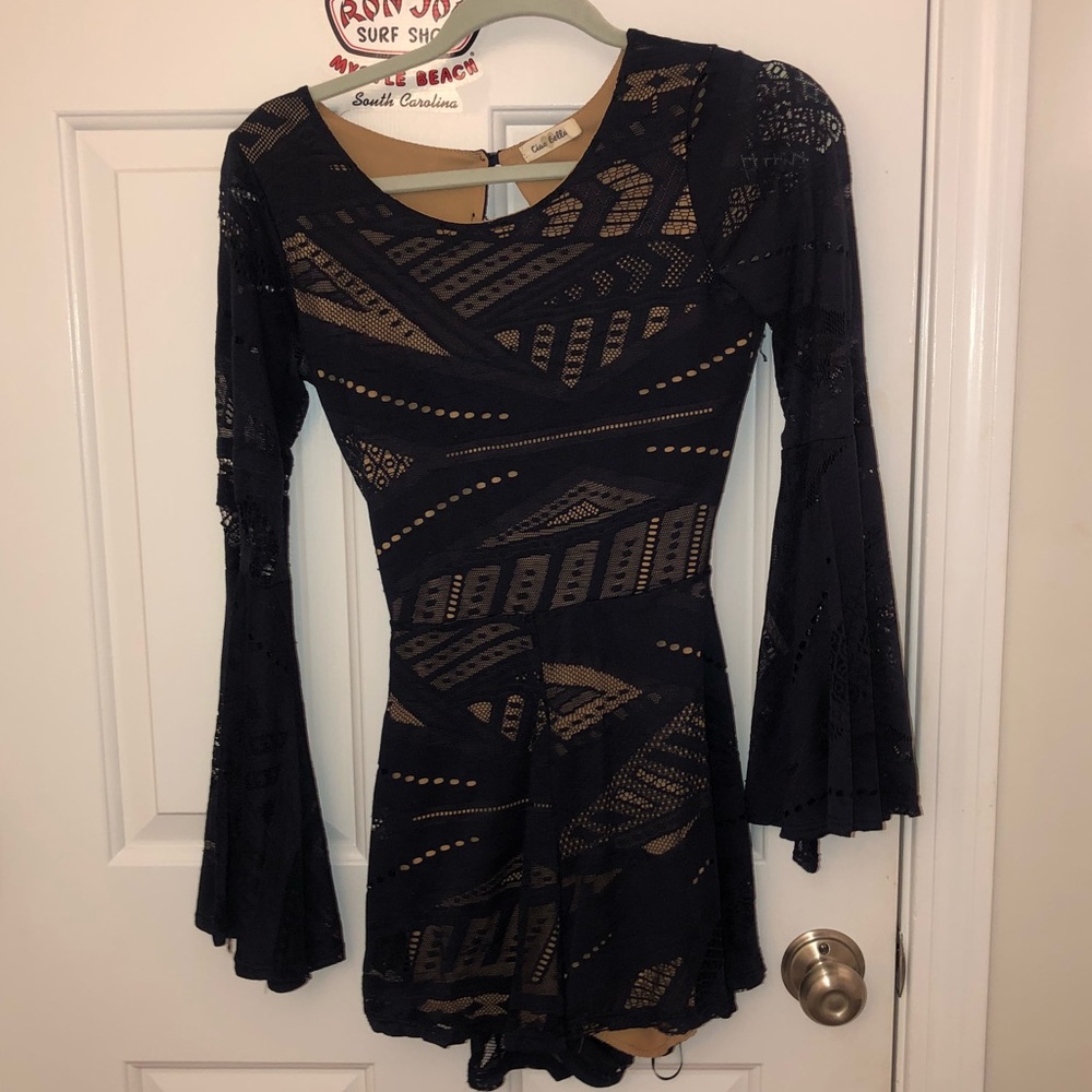Navy geometric long/bell sleeve open back romper